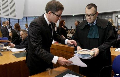 Lawyers Mikolaj Pietrzak, right, and Padraig Hughes, left, in Strasbourg court, 3 Dec 13