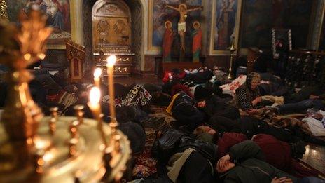 Protesters sleep at Kiev's St Michael Cathedral