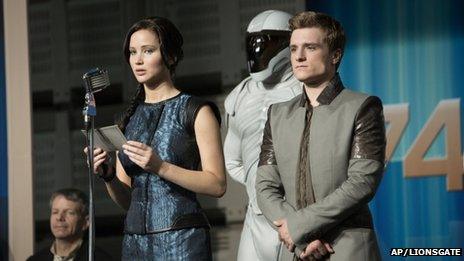 Jennifer Lawrence and Josh Hutcherson in The Hunger Games: Catching Fire