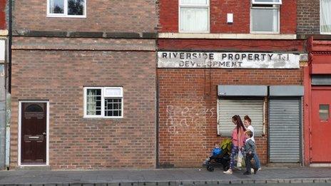 family on street