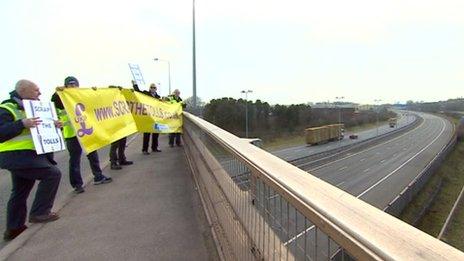 Protest above the M6 Toll motorway