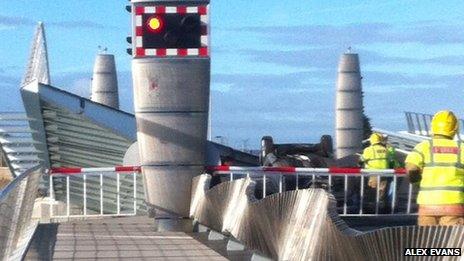 Overturned car on Poole Twin Sails bridge