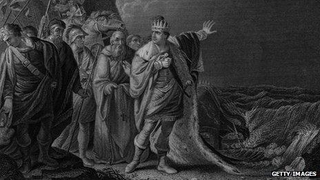 King Canute attempting to hold back the tide