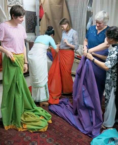 Trying on saris with the teacher