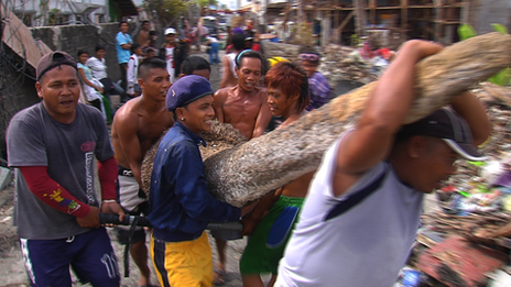 Clearing debris in Tacloban