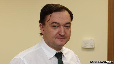 Magnitsky, in a family photograph - looking at camera