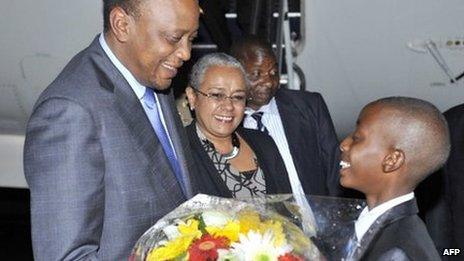 Kenya's President Uhuru Kenyatta arrives at Waterkloof Airforce Base in Pretoria on December 9, 2013 to attend the memorial service of former South African President Nelson Mandela tomorrow