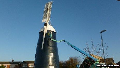 Sails being replaced on Burwell Mill