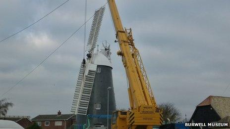 Sails being replaced on Burwell Mill