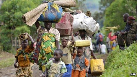 Refugees displaced by fighting are entering Uganda, Nov 2013