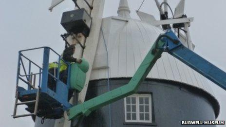 Sails being replaced on Burwell Mill