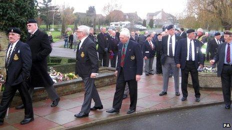 Mourners at Robert Argyle's funeral