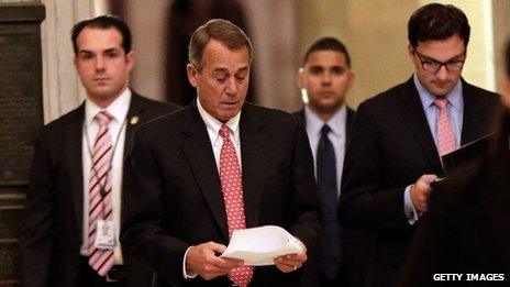 US Speaker of the House John Boehner (second from left) walked to the House Chamber on 12 December 2013