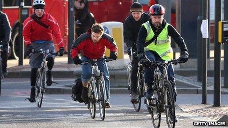 Cyclists commuting to work in London