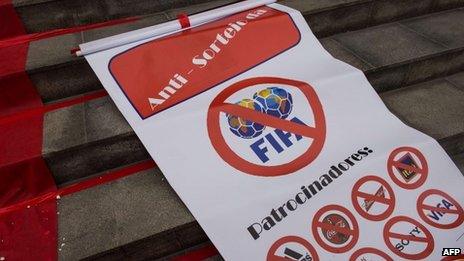 Protest sign at Maracana stadium in Rio, Brazil (6 Dec 2013)