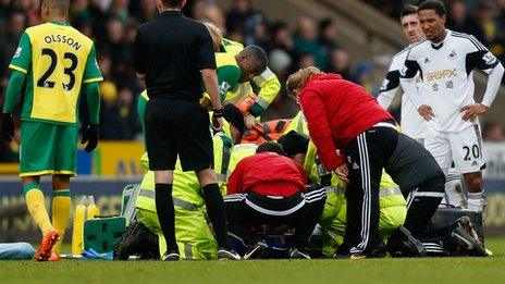 Medics attend to Swansea City's Nathan Dyer