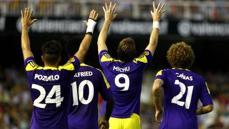 Swansea City players celebrate in the Europa League win against Valencia