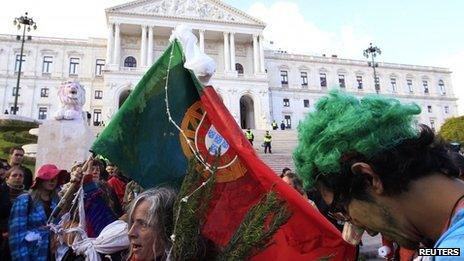 Anti-austerity protesters outside the Portuguese parliament in Lisbon