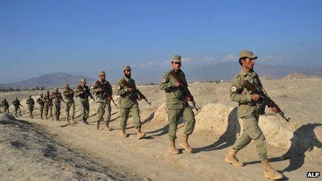 Afghan Local Police personnel on patrol in Gushta district