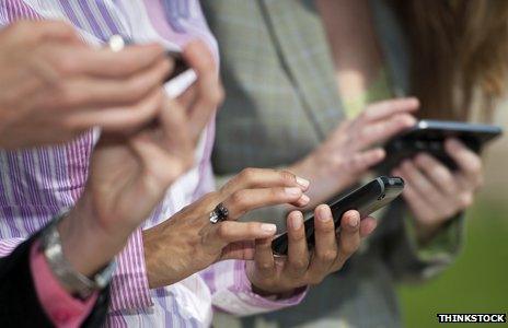 Women holding iphones