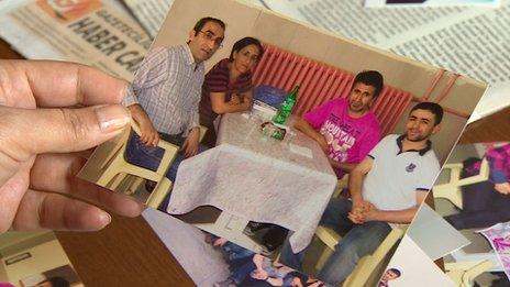 Dilsah Deniz shows a photo of her visit to her imprisoned brother Huseyin