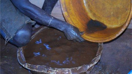 Miner panning for gold