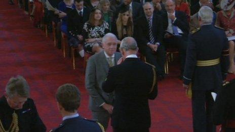 Harry Gration being presented with the MBE at Buckingham Palace