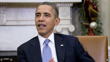 President Barack Obama speaks to the media on 18 December 2013