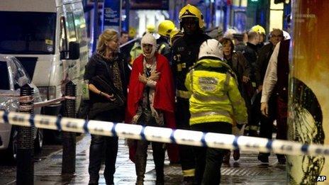 Woman bandaged at Apollo Theatre after ceiling collapse