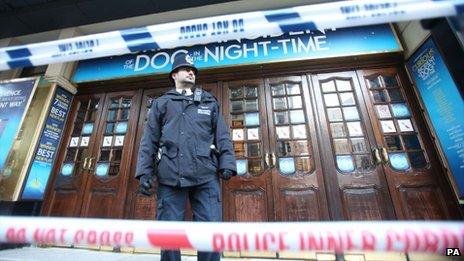 Police cordon off the Apollo Theatre in Shaftesbury Avenue, central London as investigators are trying to establish the cause of the ceiling collapse that injured 80 people, seven seriously