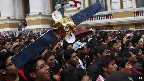 Bolivians gathered in La Paz to watch the launch on TV