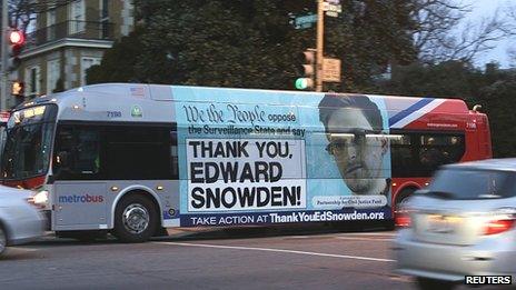 But bearing poster in support of Edward Snowden