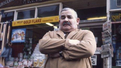 Arkwright outside the shop