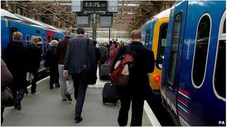 Rail commuters in King's Cross station