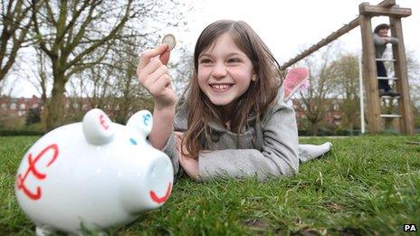 girl with piggy bank