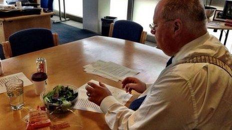 Eric Pickles eating a salad as he puts the final touches to his LGA speech