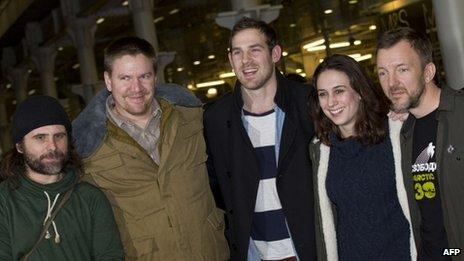 Free Greenpeace activists on arrival back in the UK