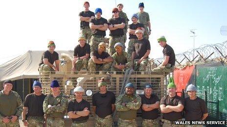 Soldiers in Afghanistan wearing Tina Selby's hats