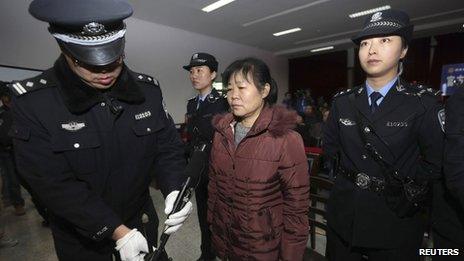 Zhang Shuxia stands trial in Weinan Intermediate People's Court in Weinan, Shaanxi province, 30 December 2013