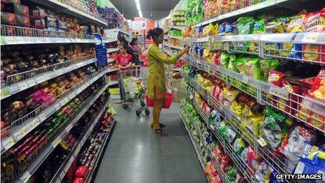 A woman shopping in a supermarket in India