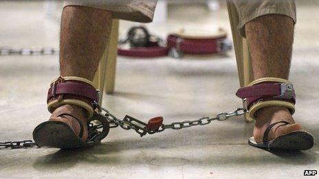 Guantanamo prisoner wearing leg restraints - file pic