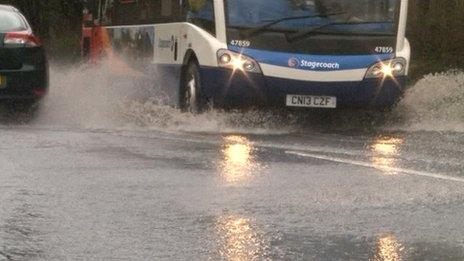 Bus going through flood water