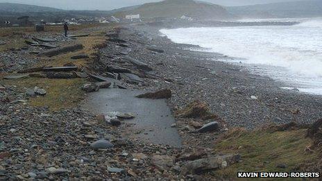 Part of the path washed away at Dinas Dinlle beach near Caernarfon