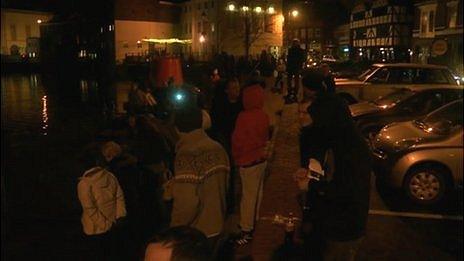 People looking at High Tide in Boston