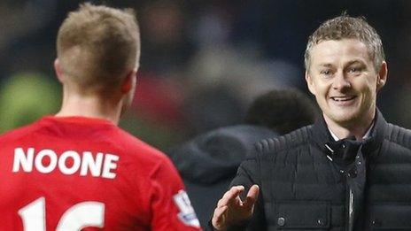 Cardiff manager Ole Gunnar Solskjaer congratulates Craig Noone after his goal at Newcastle