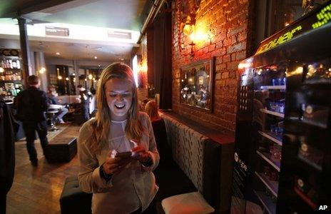 Woman checking mobile phone