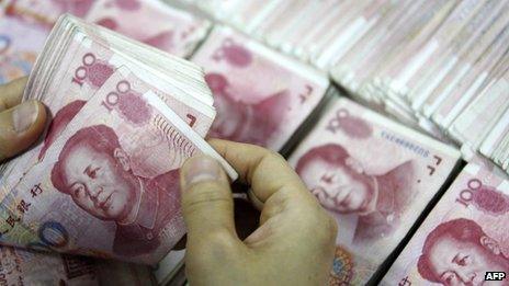 Yuan notes being counted