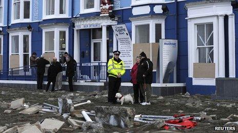 Storm damage is seen on the promenade at Aberystwyth