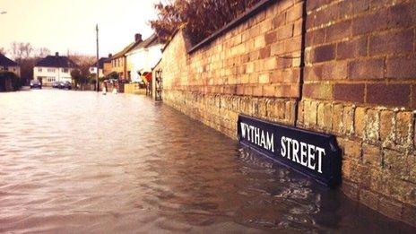 Rising flood water at Wytham Street