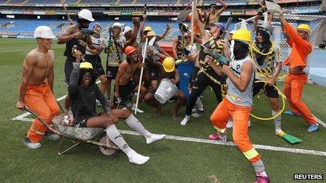 Soccer players of Botafogo soccer club participate in a flash mob dance based on a new dance craze, the "Harlem Shake", at the Joao Havelange Olympic stadium in Rio de Janeiro